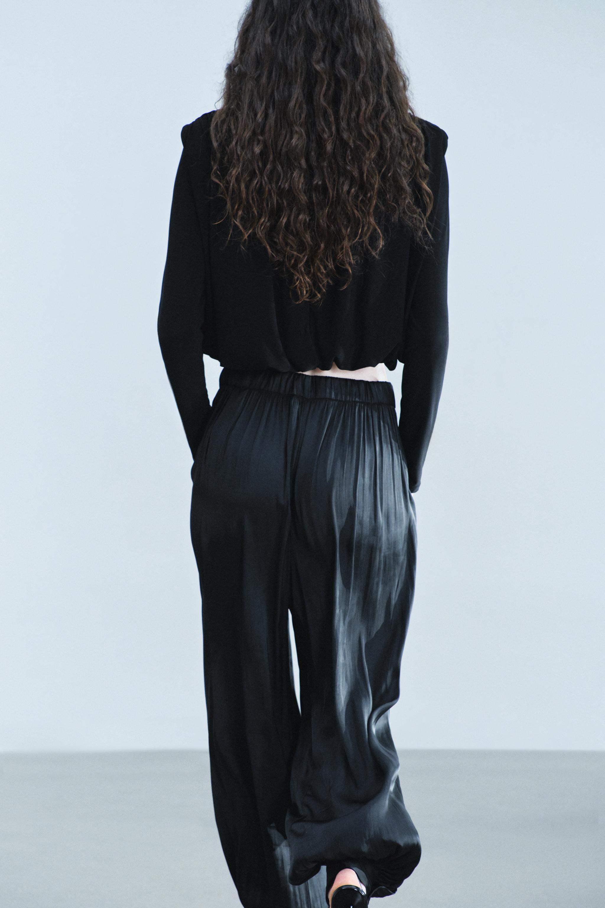 DRAPED SHOULDER-PAD TOP